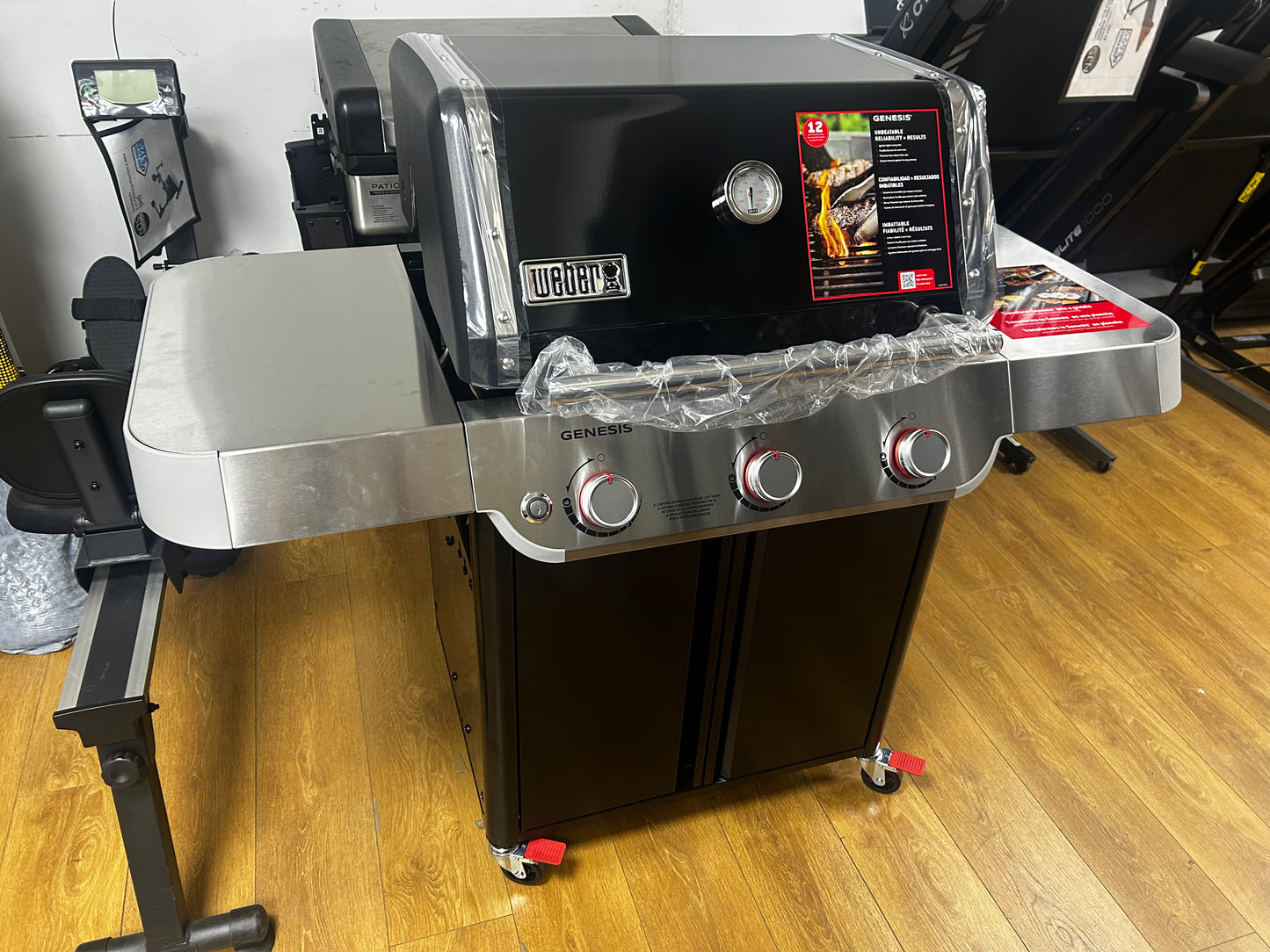Weber Genesis - 1500010 - Genesis E-315 Propane Gas Grill with PureBlu Burner, Cast-Iron Grates, Flavorizer Bars, Grease Management System, Warming Rack, Side Tables and Large Cooking Surface