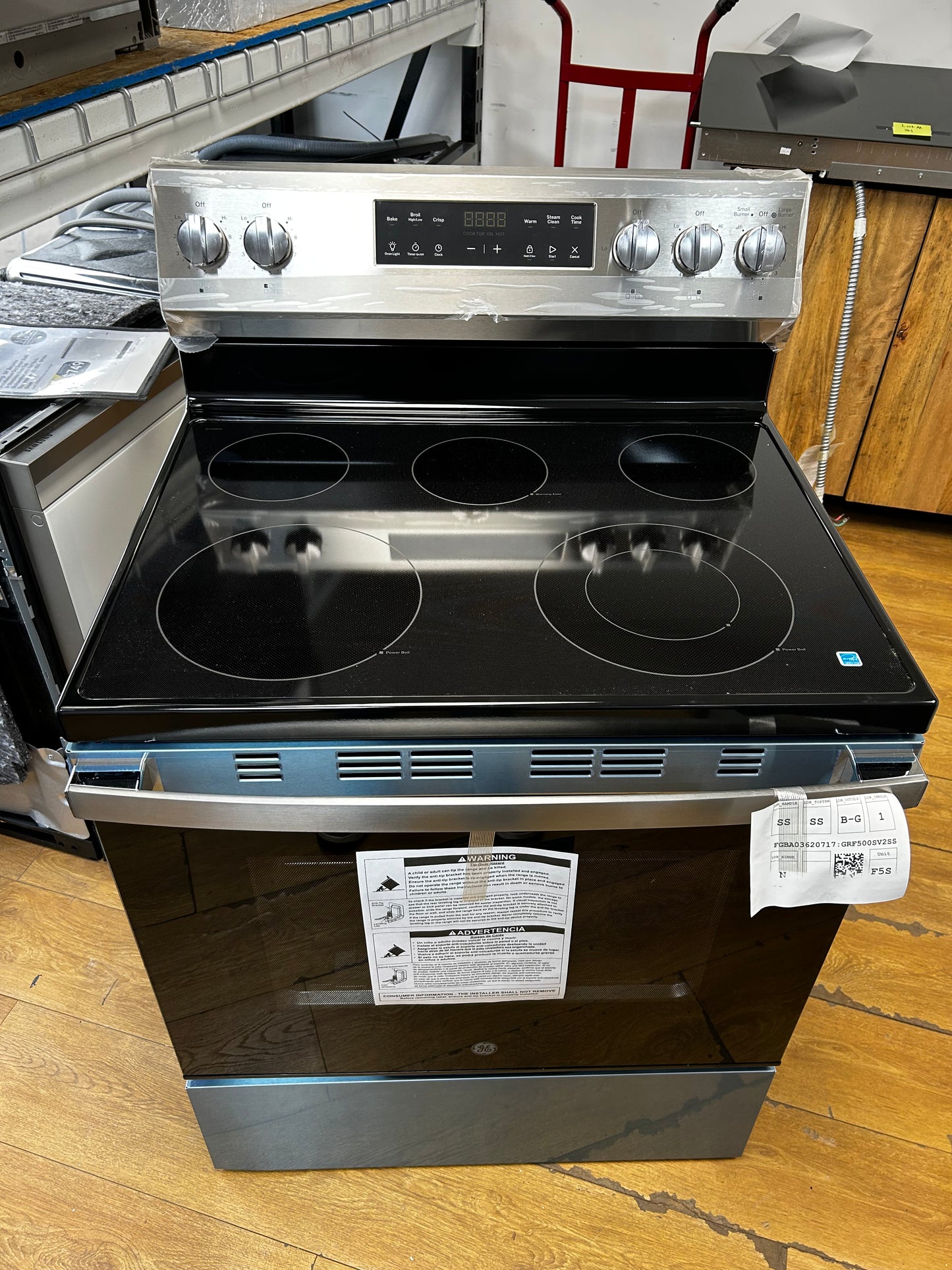 GE - 500 - Series GRF500PVSS 30 Inch Freestanding Electric Range with 5 Smoothtop Elements, 5.3 cu. ft. Oven Capacity, Power Boil™ Burner, Warming Zone, Storage Drawer, Crisp Mode, Enhanced Shabbos Mode Built In, and Self & Steam Clean: Stainless Steel