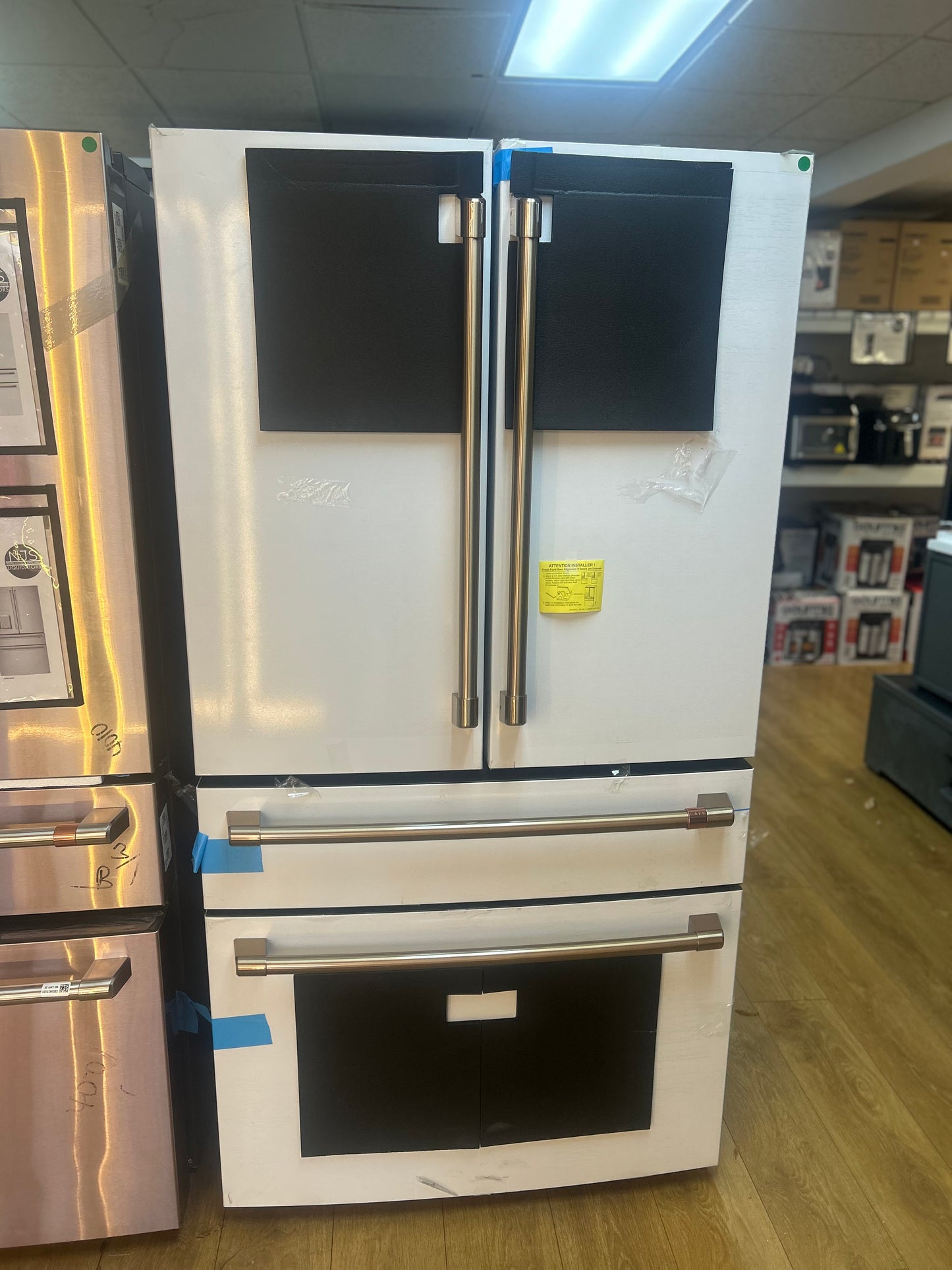 Cafe - CJE23DP4WW2 - 36 Inch Freestanding Counter-Depth 4-Door French Door Smart Refrigerator with 23.2 cu. ft. Total Capacity, and Dual-Dispense AutoFill Pitcher: Matte White with Brushed Bronze Handles