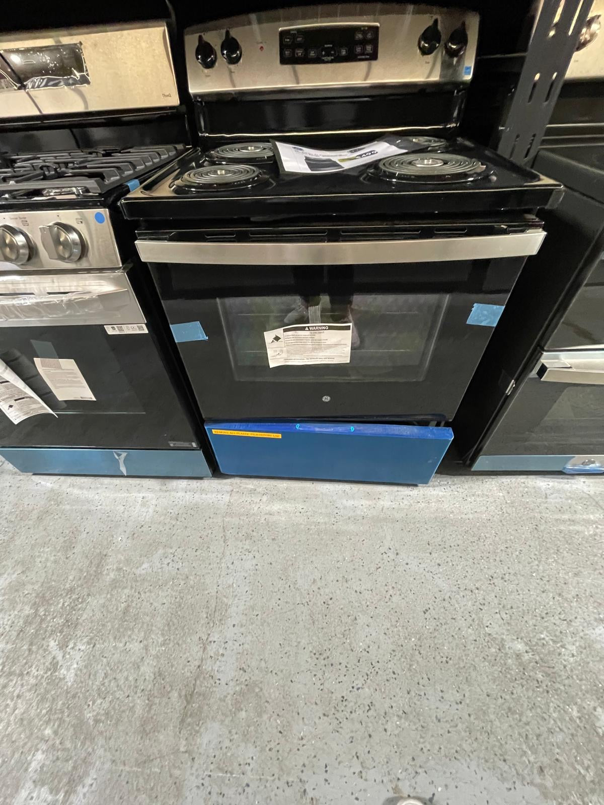 GE - JB256RTSS - 30 Inch Freestanding Electric Range with 4 Coil Burners, 5.0 cu. ft. Oven Capacity, Storage Drawer, Sensi-Temp Technology, Dual-Element Bake, Sabbath Mode, and Self-Clean: Stainless Steel