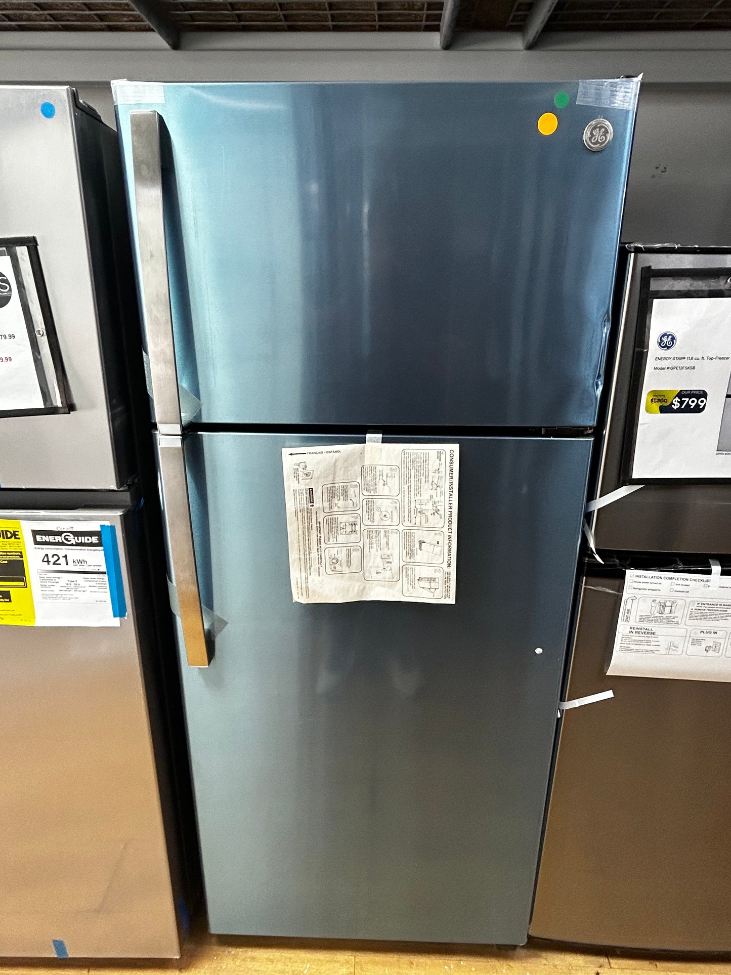 GE - GIE18GSNRSS - 28 Inch Top Freezer Refrigerator with 17.5 Cu. Ft. Capacity, Reversible Hinges, Gallon Door Shelves, Adjustable Full-Width Glass Shelves, Ice Maker, Deli Drawer, Sabbath Mode, and Energy Star Certified: Stainless Steel