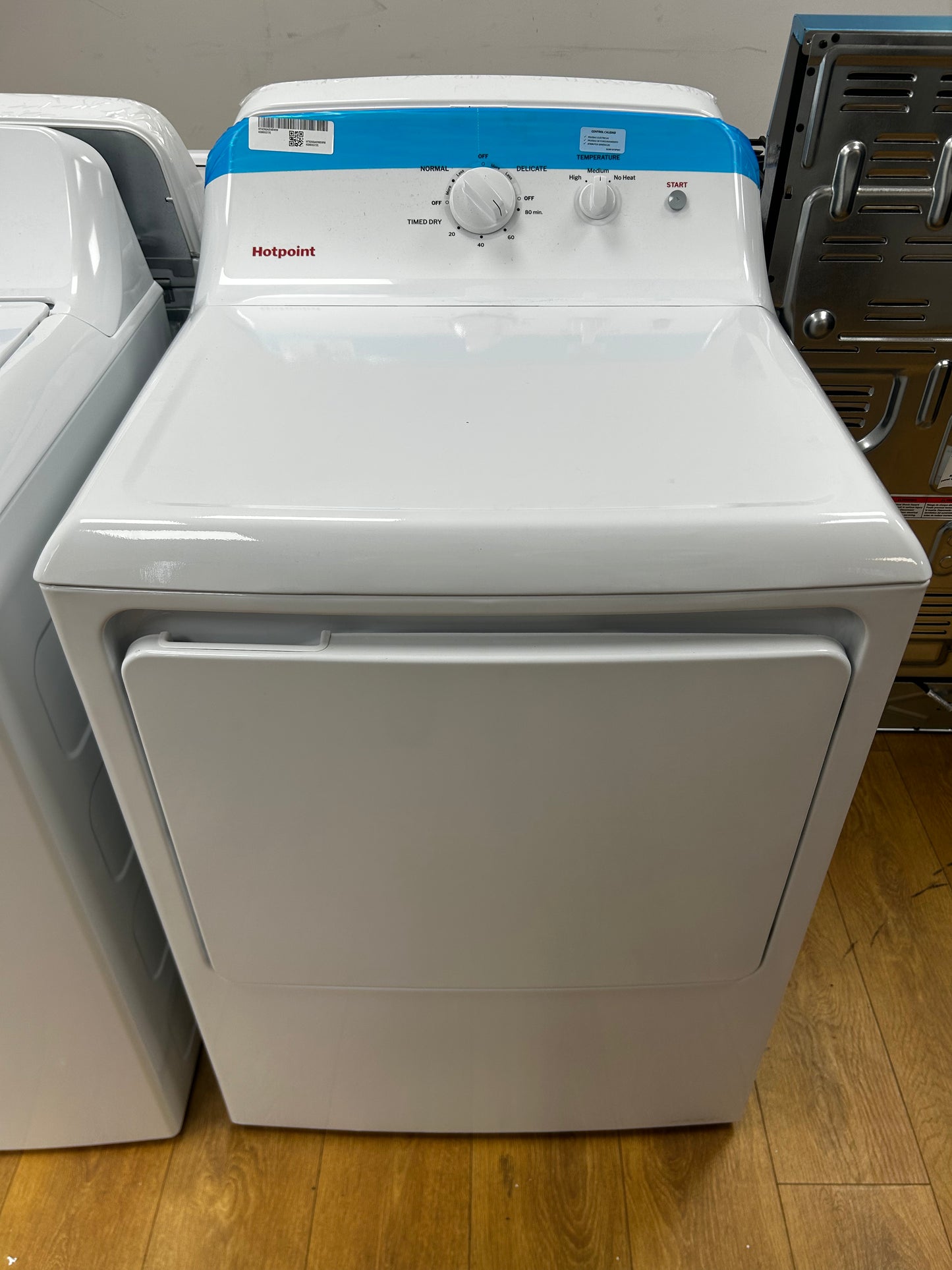 Hotpoint - HTX26GASWWW - 27 Inch Top Load Gas Dryer with 7.2 cu ft Capacity, Auto Dry, Powerful Venting, Large Diffuser, Aluminized Drum, Reversible Dryer Door, Shallow Depth Design and Up Front Lint Filter