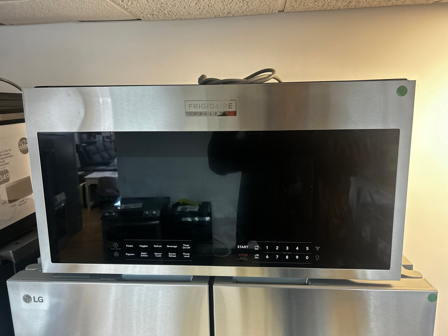 Frigidaire Gallery Series - GMOS1964AF - 1.9 cu. ft. Over-The-Range Microwave with 1,000 Watts, 3-Speed 400 CFM Venting System, Glass Turntable, Sensor Cook, and LED Lighting: Stainless Steel