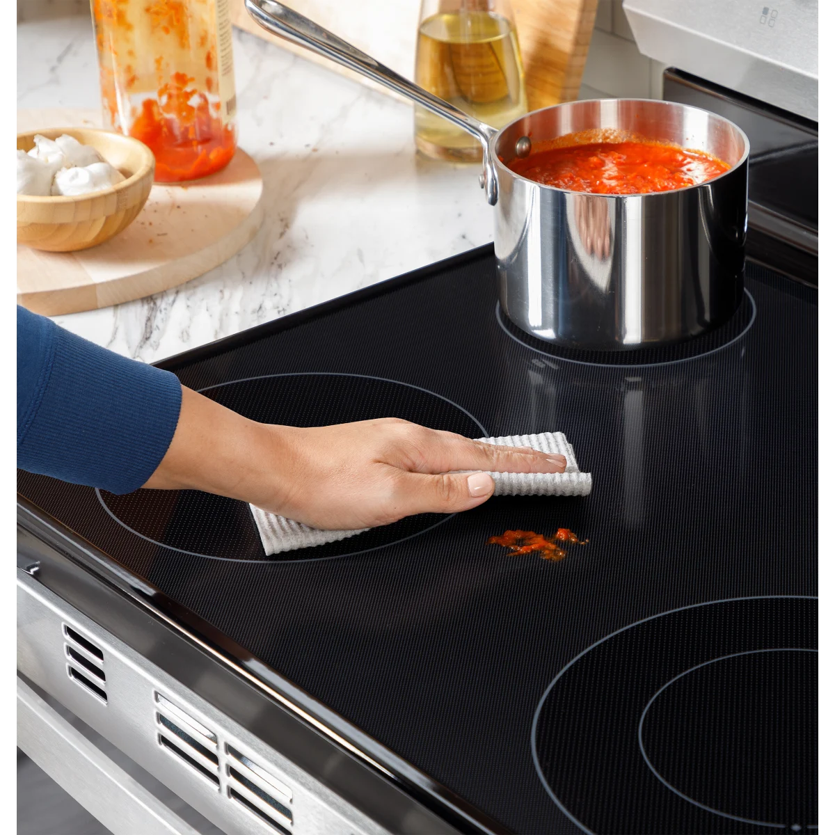 GE - 500 - Series  GRF500PVSS 30 Inch Freestanding Electric Range with 5 Smoothtop Elements, 5.3 cu. ft. Oven Capacity, Power Boil™ Burner, Warming Zone, Storage Drawer, Crisp Mode, Enhanced Shabbos Mode Built In, and Self & Steam Clean: Stainless Steel