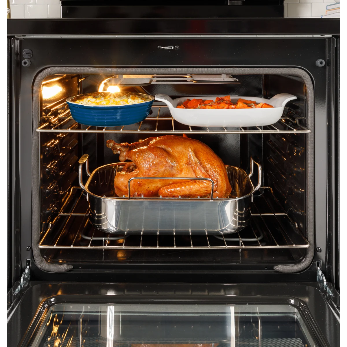 GE - 500 - Series  GRF500PVSS 30 Inch Freestanding Electric Range with 5 Smoothtop Elements, 5.3 cu. ft. Oven Capacity, Power Boil™ Burner, Warming Zone, Storage Drawer, Crisp Mode, Enhanced Shabbos Mode Built In, and Self & Steam Clean: Stainless Steel
