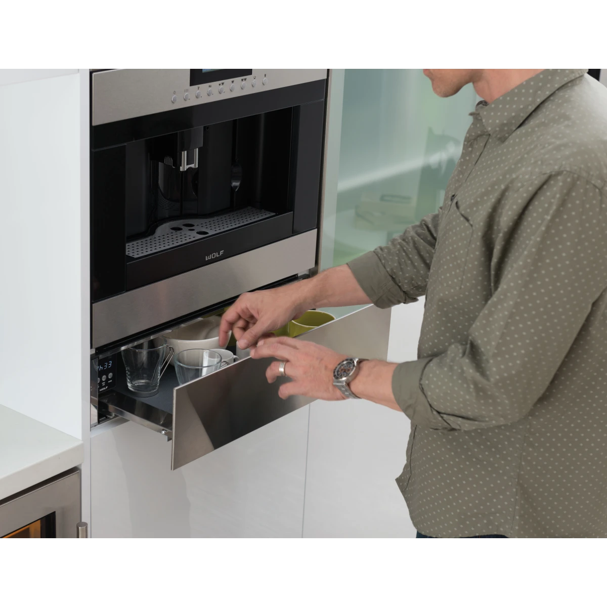 Wolf - EC24S - 24 Inch Built-in Coffee System with Adjustable Grinder, Auto On/Off, Descaling, Hot Water Dispenser, Removable Milk Carafe, Mounted Glide System and Non-Plumbed: Stainless Steel