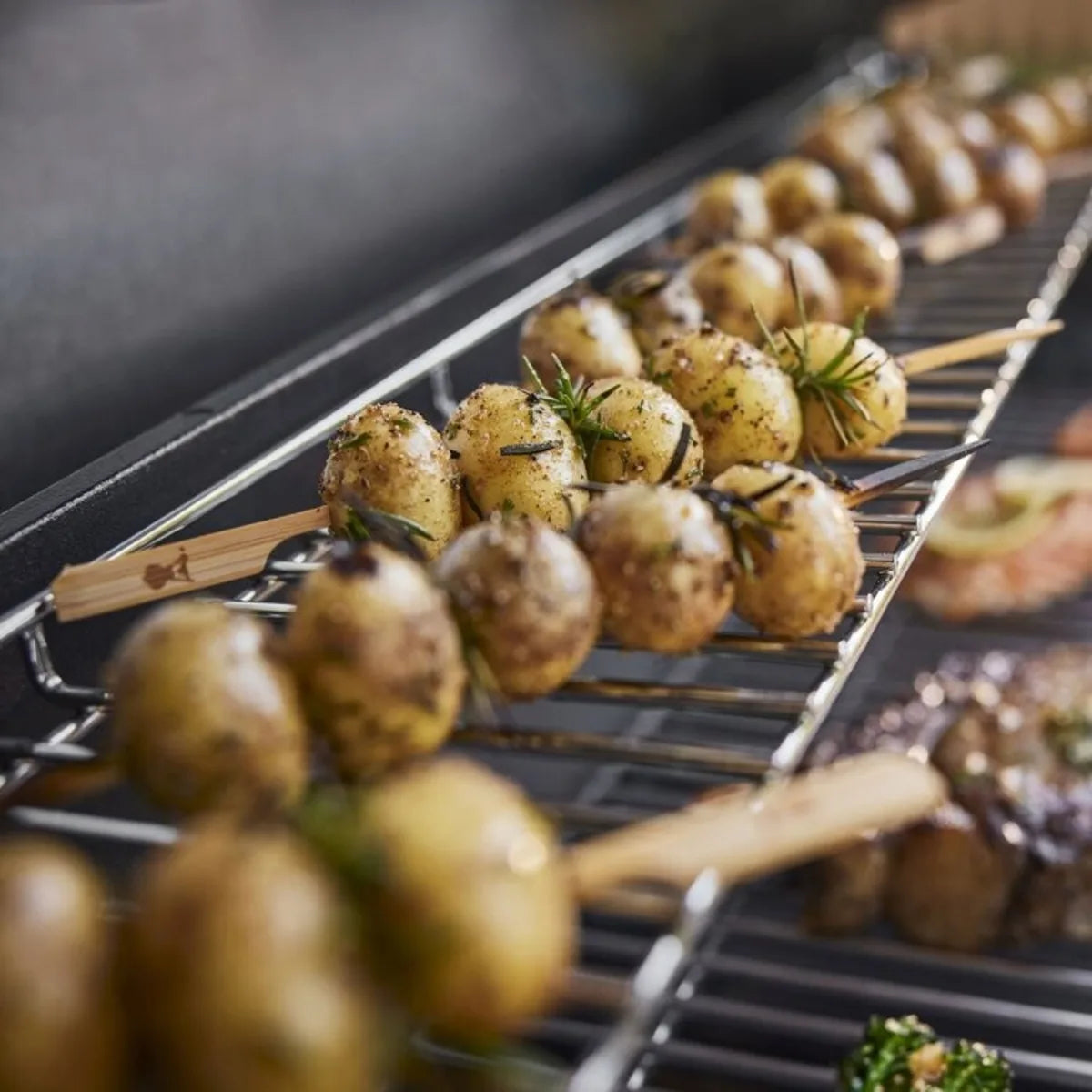 Weber Genesis - 1500580 - 64 1/2 Inch Genesis S-415 Natural Gas Grill with 820 sq. in. Total Cooking Area, PureBlue Burner, Cooking Grates, Flavourizer Bars, and Grease Management System