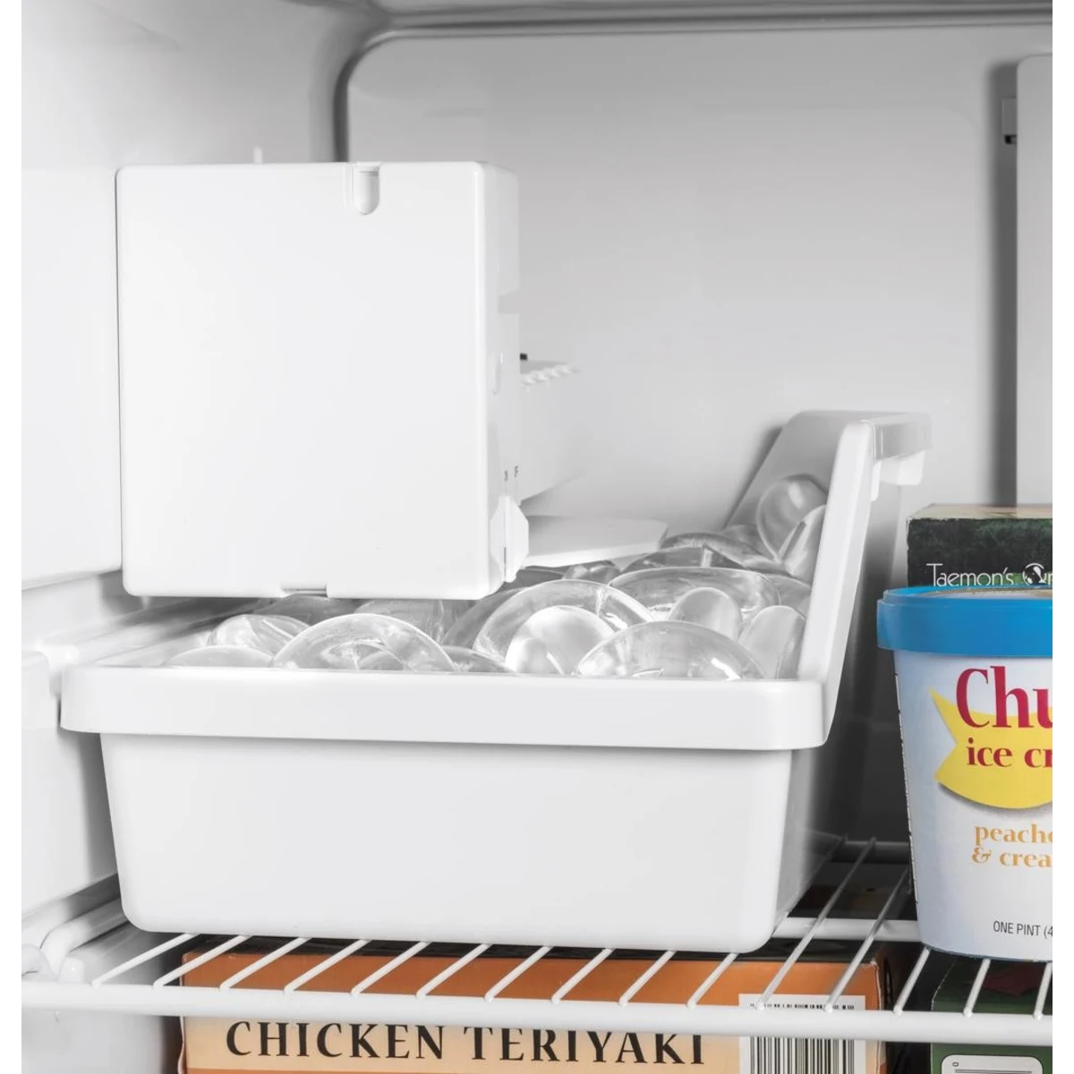 GE - GIE18GSNRSS - 28 Inch Top Freezer Refrigerator with 17.5 Cu. Ft. Capacity, Reversible Hinges, Gallon Door Shelves, Adjustable Full-Width Glass Shelves, Ice Maker, Deli Drawer, Sabbath Mode, and Energy Star Certified: Stainless Steel