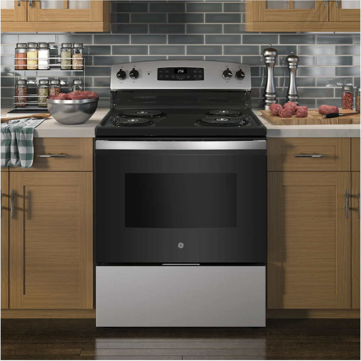 GE - JB256RTSS - 30 Inch Freestanding Electric Range with 4 Coil Burners, 5.0 cu. ft. Oven Capacity, Storage Drawer, Sensi-Temp Technology, Dual-Element Bake, Sabbath Mode, and Self-Clean: Stainless Steel
