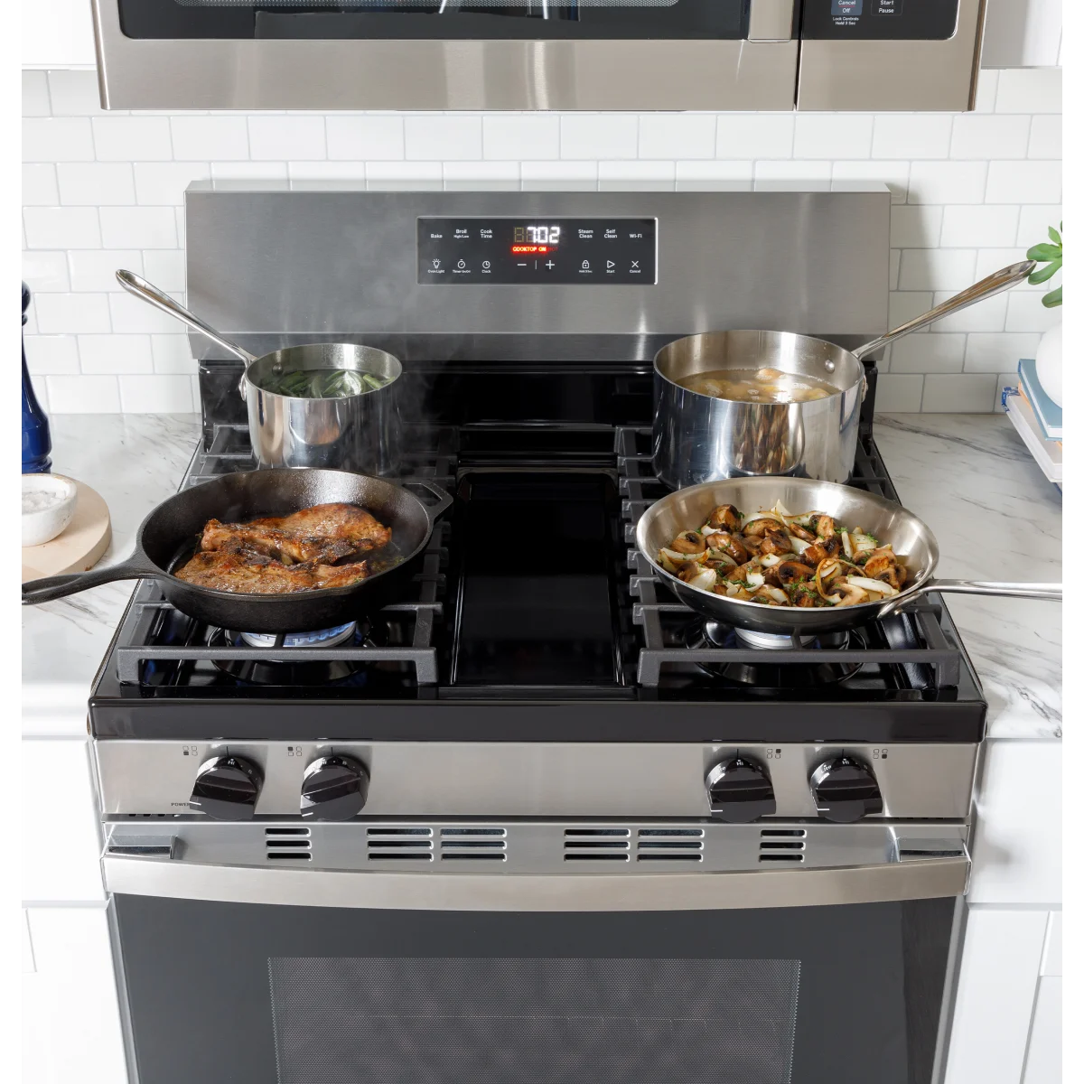 GE - GGF400PVSS - 400 Series 30 Inch Freestanding Gas Smart Range with 4 Sealed Burners, 5.3 cu. ft. Oven Capacity, Power Boil™ Burner, Storage Drawer, SmartHQ™, Enhance Shabbos Mode Built In, and Self & Steam Clean: Stainless Steel